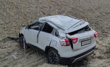 A car travelling at high speed on the under-construction Ganga Expressway collided with a cement pipe and overturned into a drain.