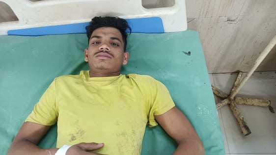 Teenager suffers burns after coming in contact with a hanging wire in a field