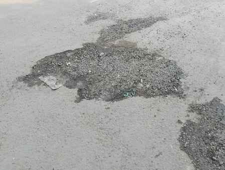 Deep pits outside the GRP station are inviting accidents.
