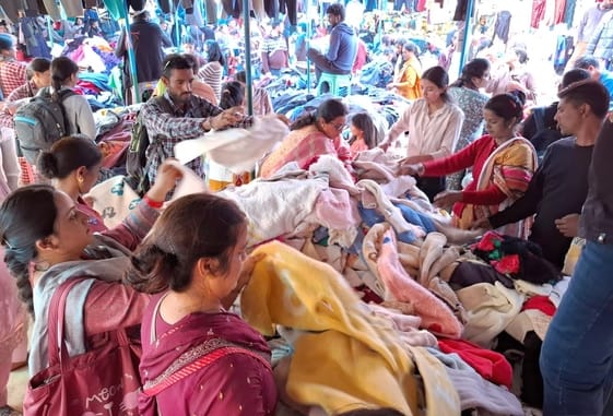 Women coming to buy cosmetics and kitchen items