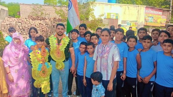 Long jump winner Mansi was honored