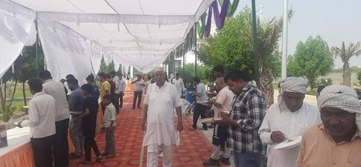 A community feast was organised to promote brotherhood in the society.