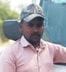 Pickup collides with truck parked on the roadside, driver dies
