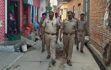 A report has been filed against 15 people, including the Pradhan's husband, for attacking relatives of the murder accused.