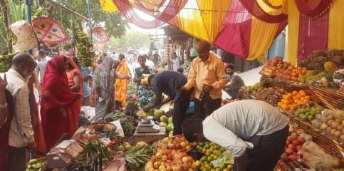 Long queues of women gathered in the markets to buy puja items.