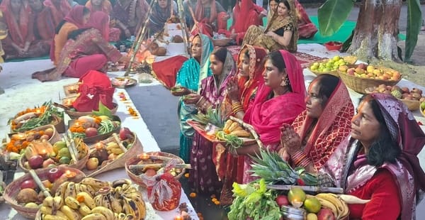 Wishing for happiness and prosperity by offering prayers to the rising sun