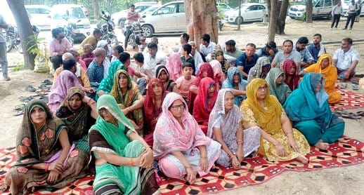People staged a sit-in at the Collectorate alleging encroachment on the holy site.