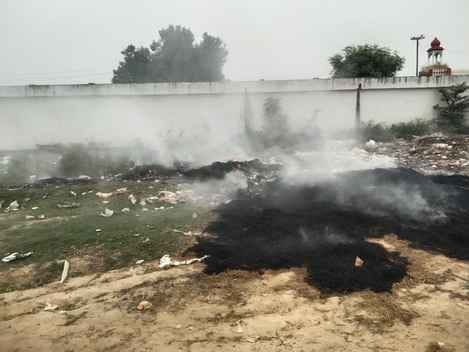 Garbage burning in the exhibition ground is increasing pollution