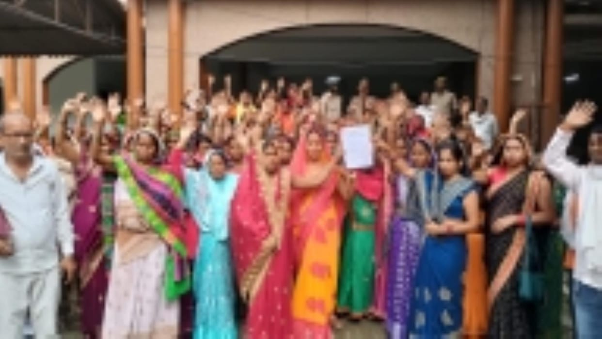 Caretakers of community toilets protest at the Collectorate