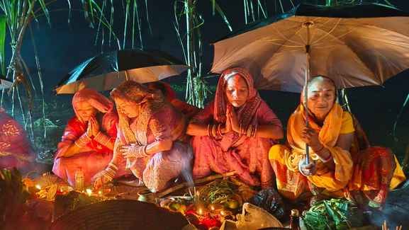 The rain tested their faith, but the devotees remained undeterred.