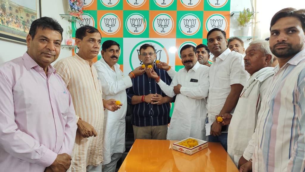 Celebrated by feeding laddus to the Minister of State