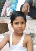 A child died after falling into the tank of a municipal toilet under construction.