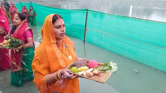 Breaking the waterless fast by offering prayers to the rising sun