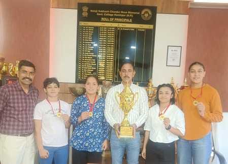 Women wrestlers from Hamirpur won the trophy in wrestling.