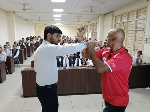 Teach self-defense techniques to girl students