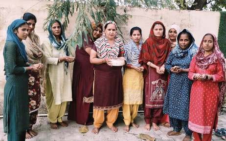 Women performed puja and charity on Amla Navami.