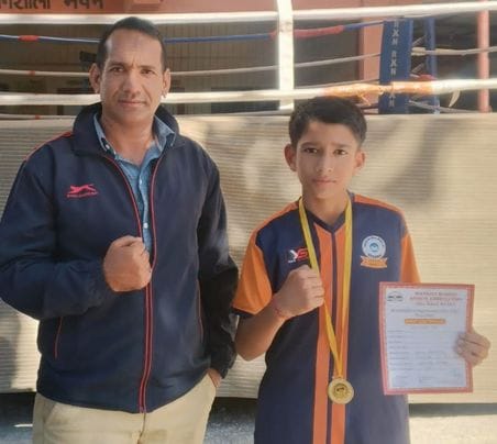 Suraj won silver medal in boxing