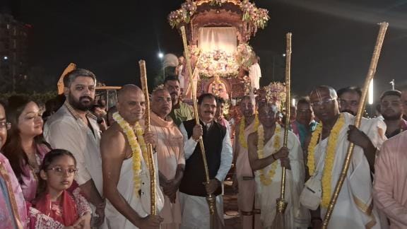 A large crowd gathered for the Radha Vrindavan Chandra procession.