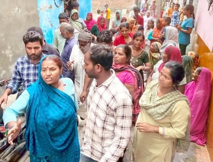 A tractor suddenly came from the field and hit a bike, killing two labourers.