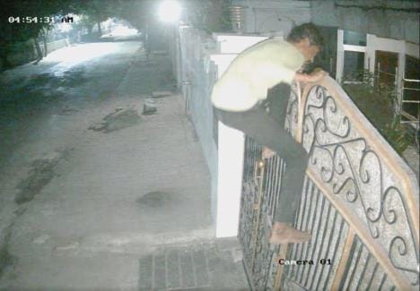 A thief broke into the house by jumping over the gate, the family woke up and caught him.
