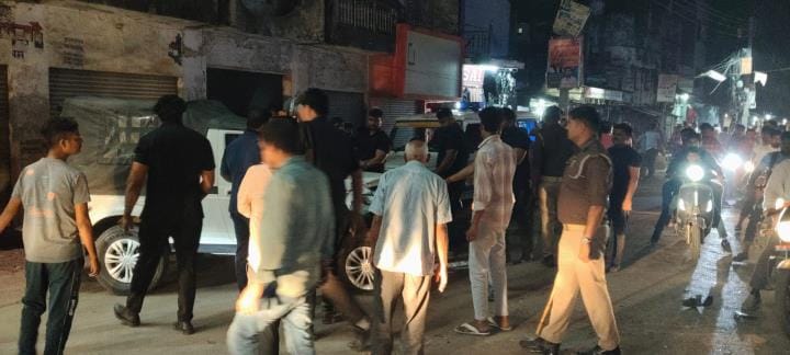 Former minister Ashok Yadav's car collides with a tractor; private security guard beats driver, causing uproar