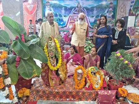 Lord Shaligram arrived at the temple with a band and procession to marry Tulsi.
