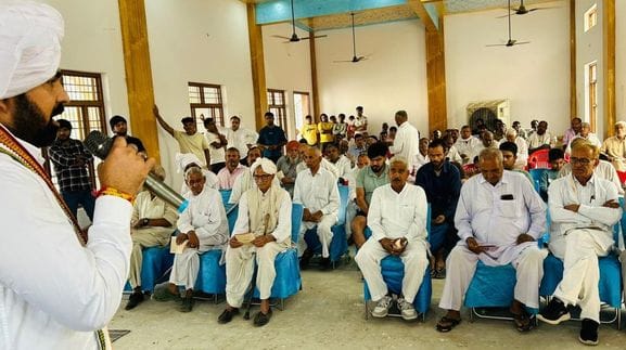 MLA Pawan visited the villages and invited them for the function.