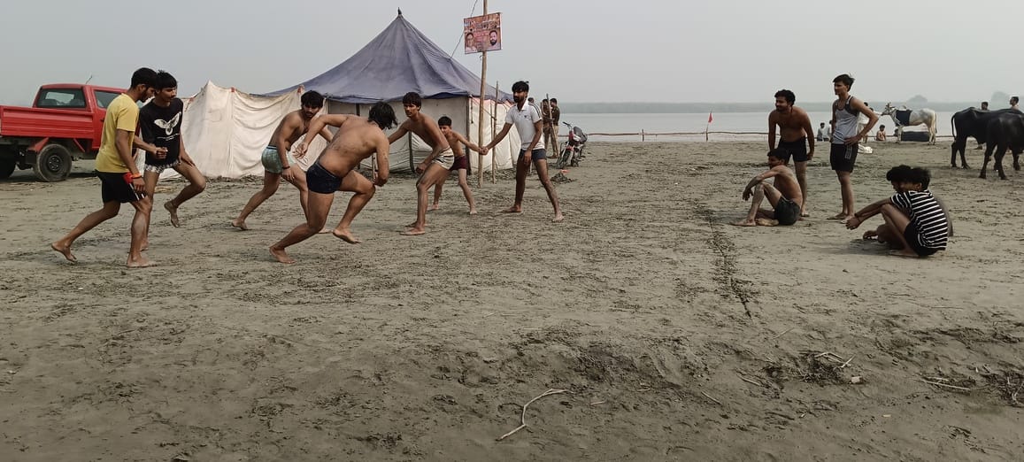 Various colors of culture are visible on the banks of the Ganges