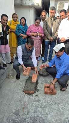 Laying the foundation stone of Mahila Mandal Bhawan