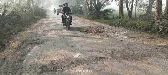 The road has neither been widened nor pothole-free, making travel difficult.