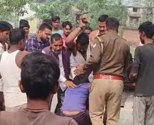 The youth continued to be beaten, while the police remained spectators