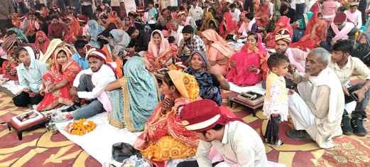 The mass wedding ceremony was held with traditional Vedic rituals.