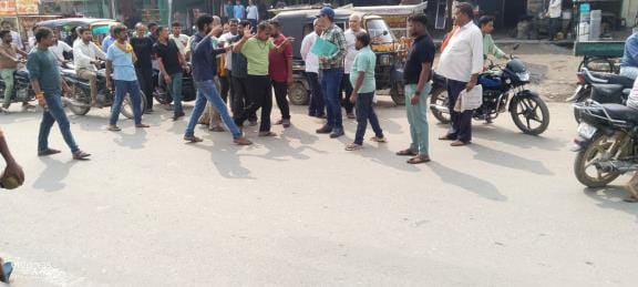 Two young men on a bike were chased and beaten.