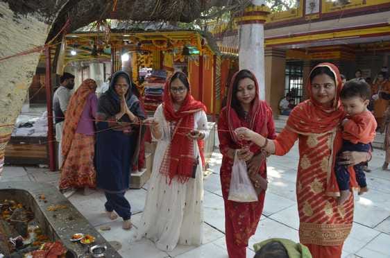 Devotees donated lamps and tied threads of their wishes.