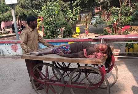 Disabled woman injured in car collision carried to hospital on cart, dies