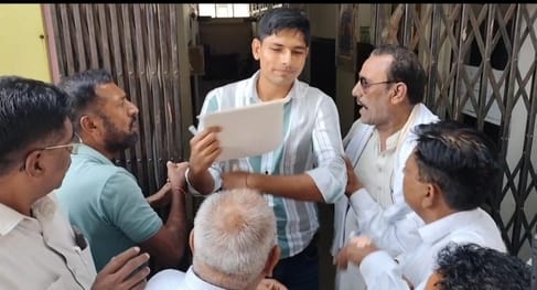 The councillors dragged the secretary out and locked the gate