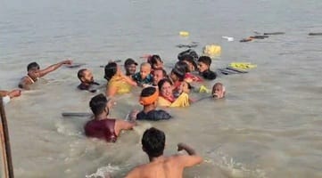 A small boat full of devotees capsized in the Saryu River, but all were safe.