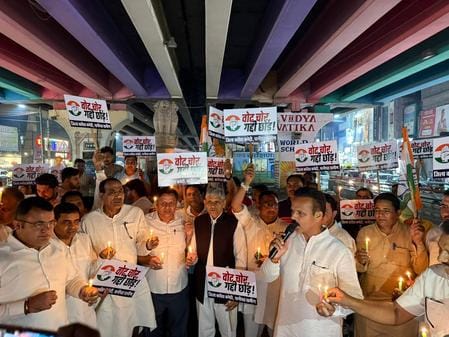 Congress workers staged a candlelight march alleging vote theft.