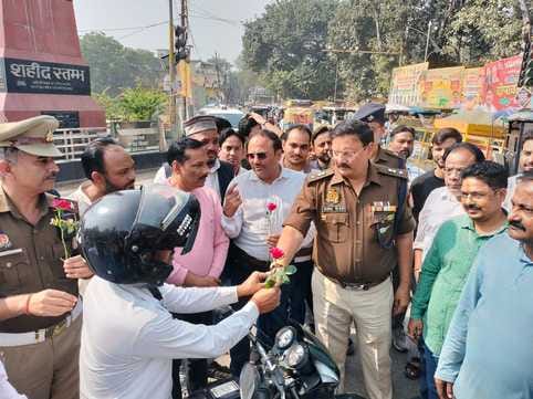 The SP presented roses to those wearing helmets.