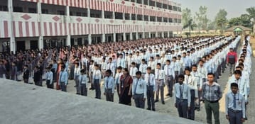 Students and teachers sang the national anthem.