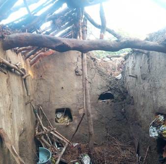 A spark from a stove ignited a fire, burning a farmer's household, including cash