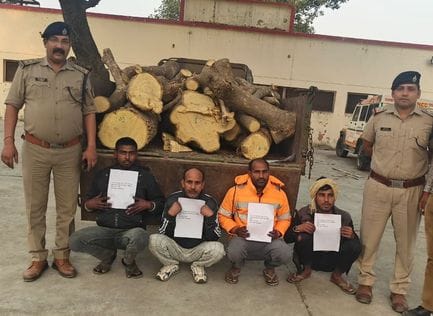 Four people, including a railway employee, were arrested with stolen wood.