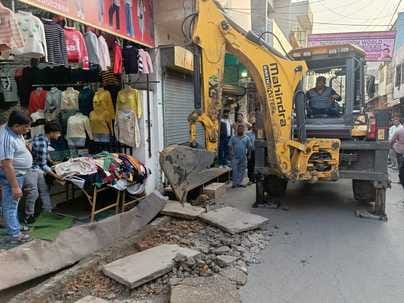 The municipality removed the encroachment outside the shops in the market.