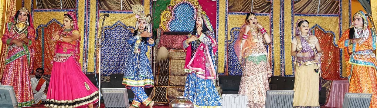 Raasleela: Krishna dances with the Gopis in Maharas, audience enthralled