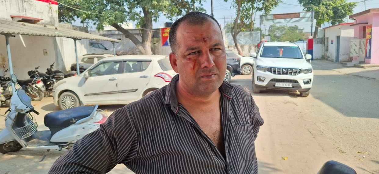 Two villagers fight over lifting bricks