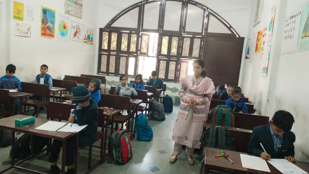 Students enthusiastically appeared for the Amar Ujala National Olympiad exam.