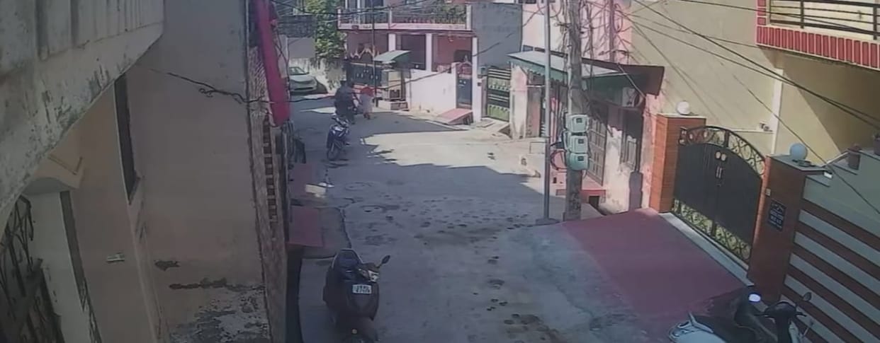 Two bike-riding youths snatched a woman's purse.