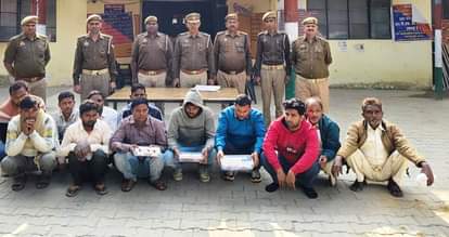 Gambling den raided, 12 arrested