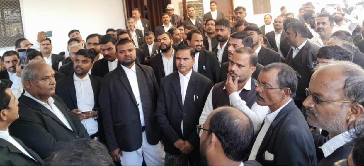 Lawyer and his two sons attacked with a knife after entering the chamber