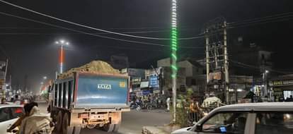 The market is buried under a blanket of dust from sand-laden trucks, traders said - it's becoming difficult to breathe, business has come to a standstill.